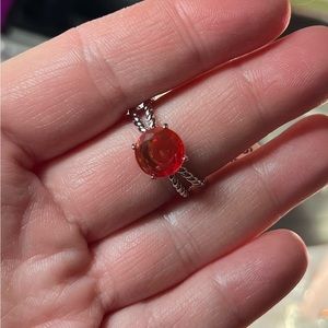 lab created tangerine pink bi color tourmaline on rhodium plating. SRP $98